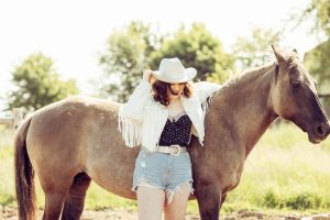 cowgirl and horse at a farm in norfolk county