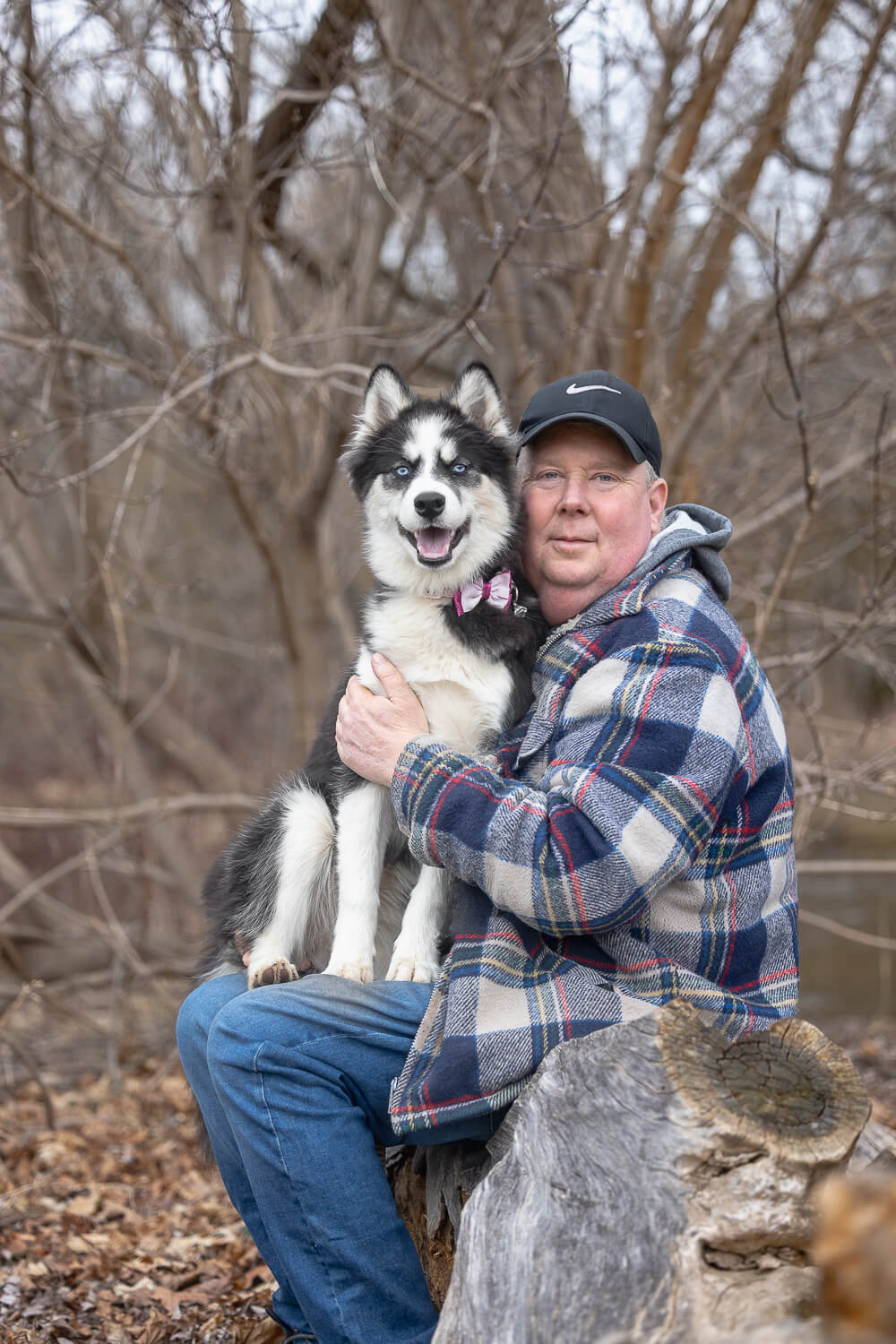 dog dad sitting with puppy Burlington Pet Photographer captures a puppy and her human