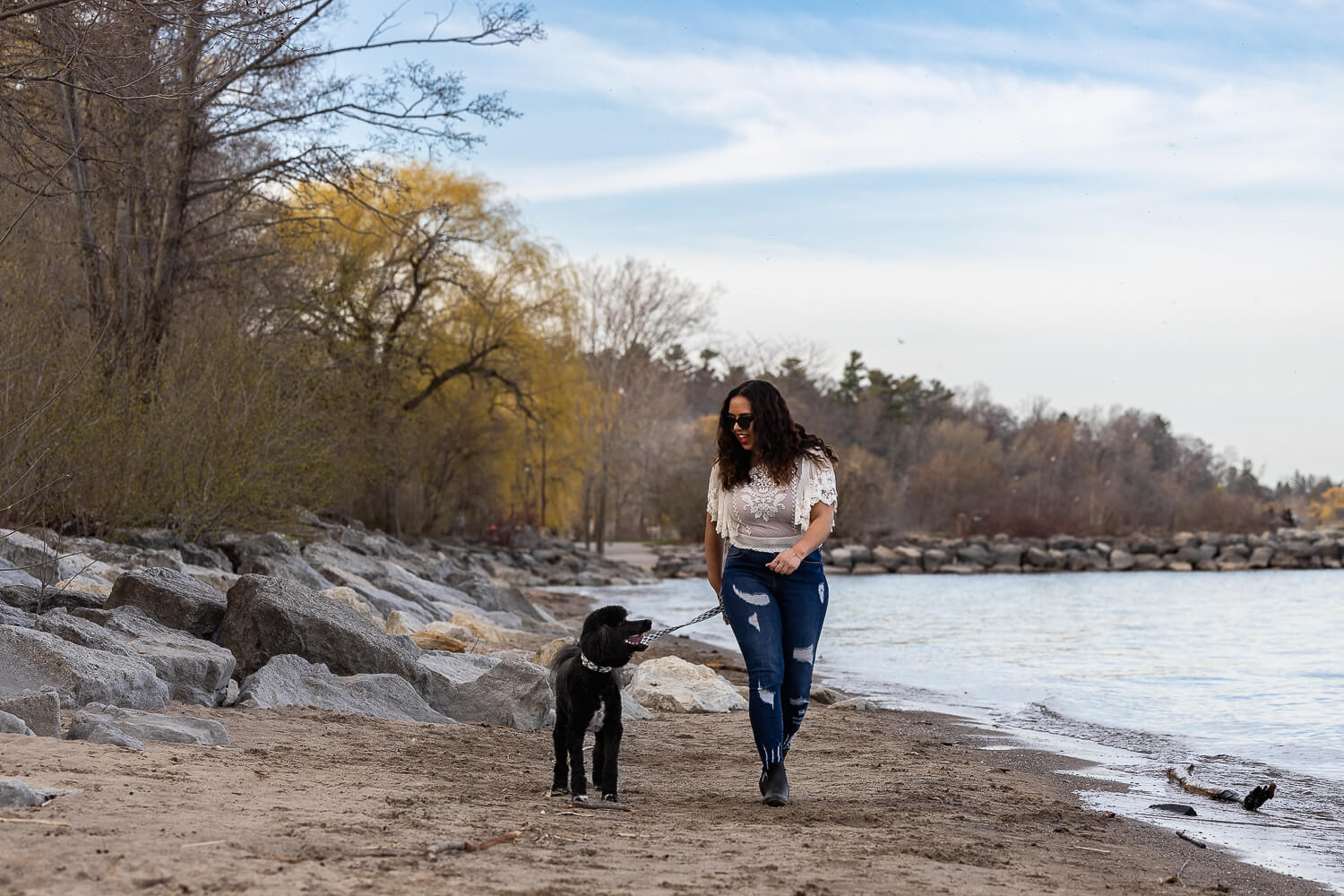 pet and family photography in Mississauga, Ontario pet and family walking image in Mississauga.