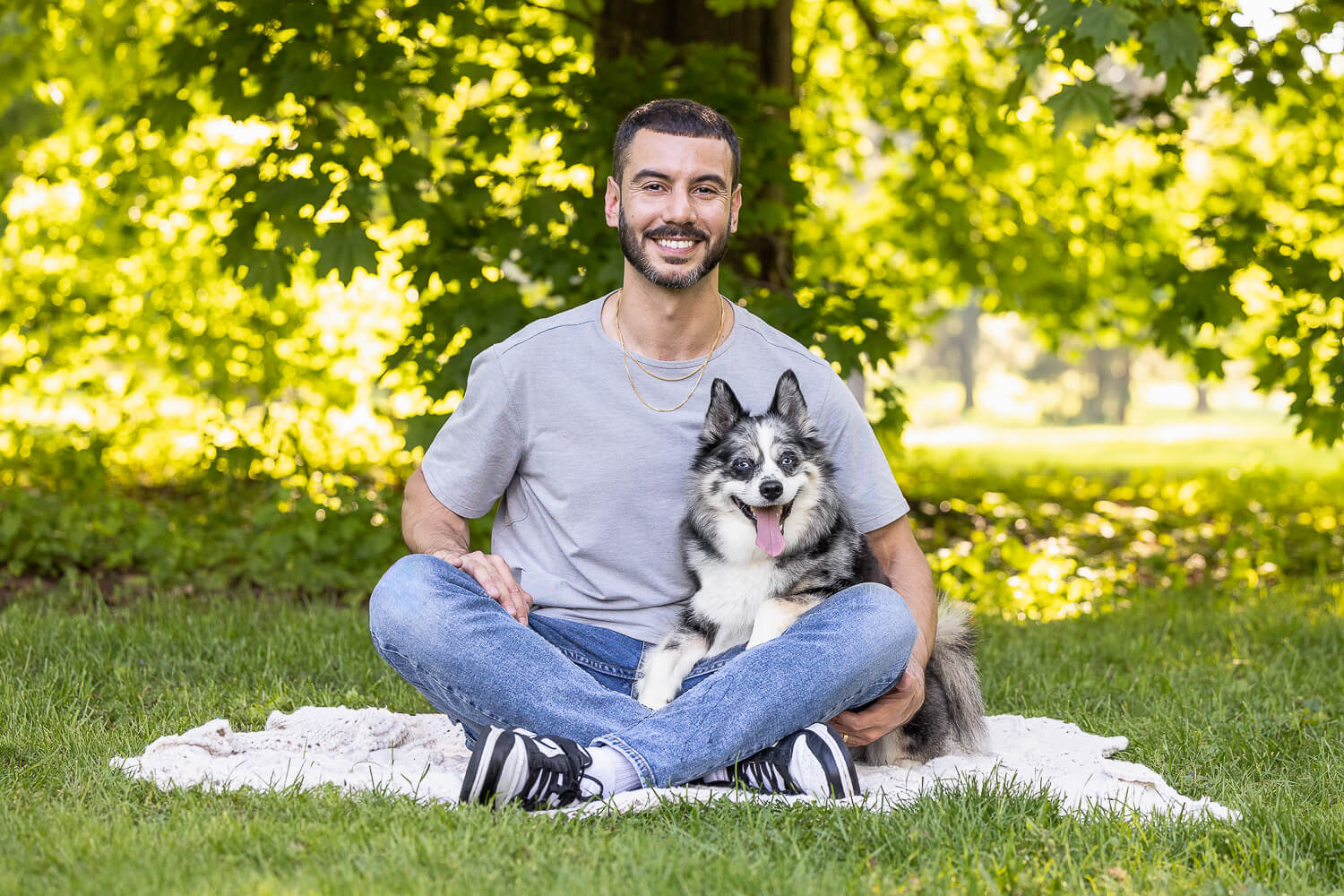 dog dad with his dog posing for a family and pet photo session
