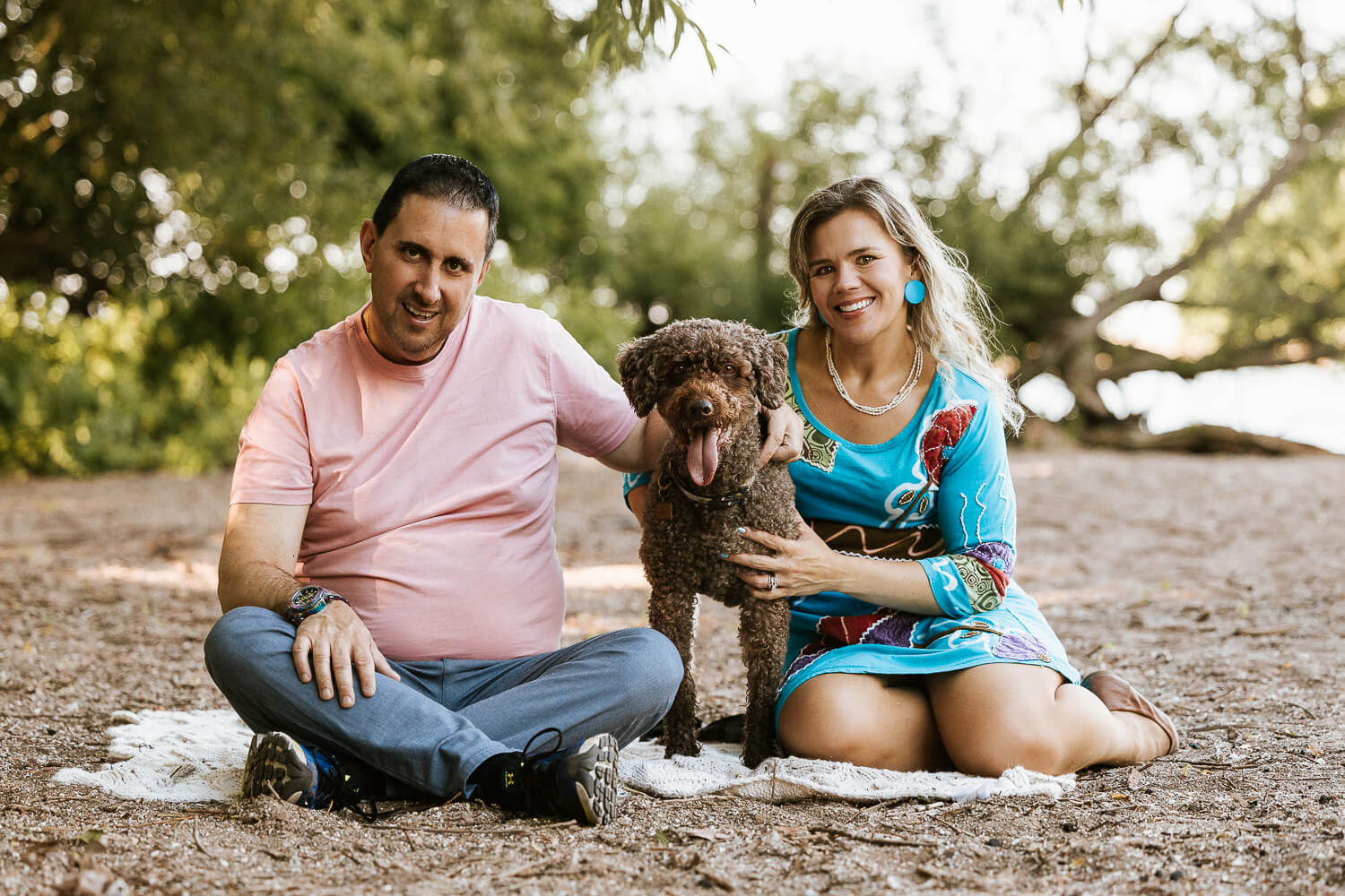 dog family photoshoot dog and family posing during a pet and family photo session.