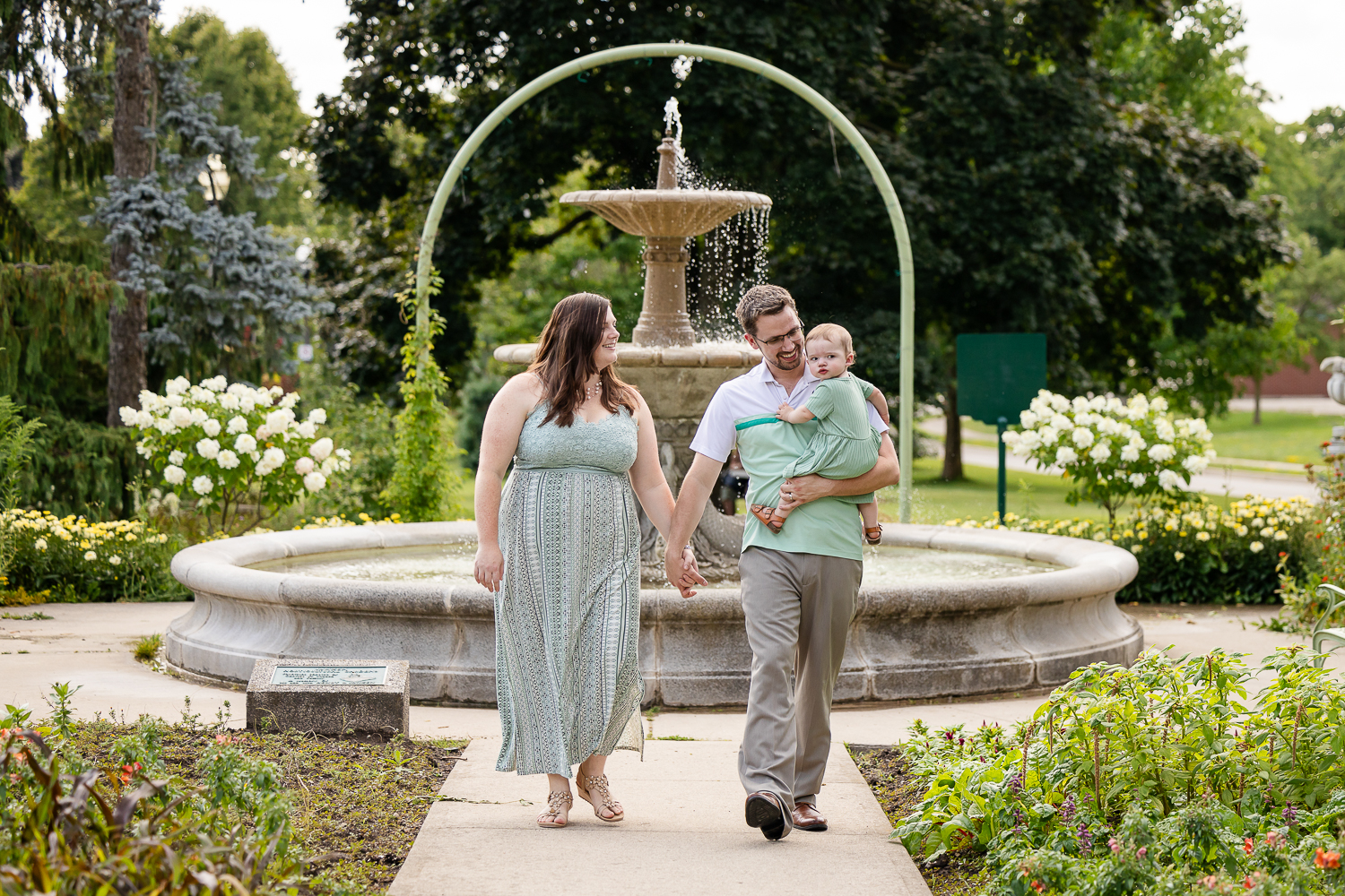 photographer kitchener waterloo family walking towards the camera at a family photo session