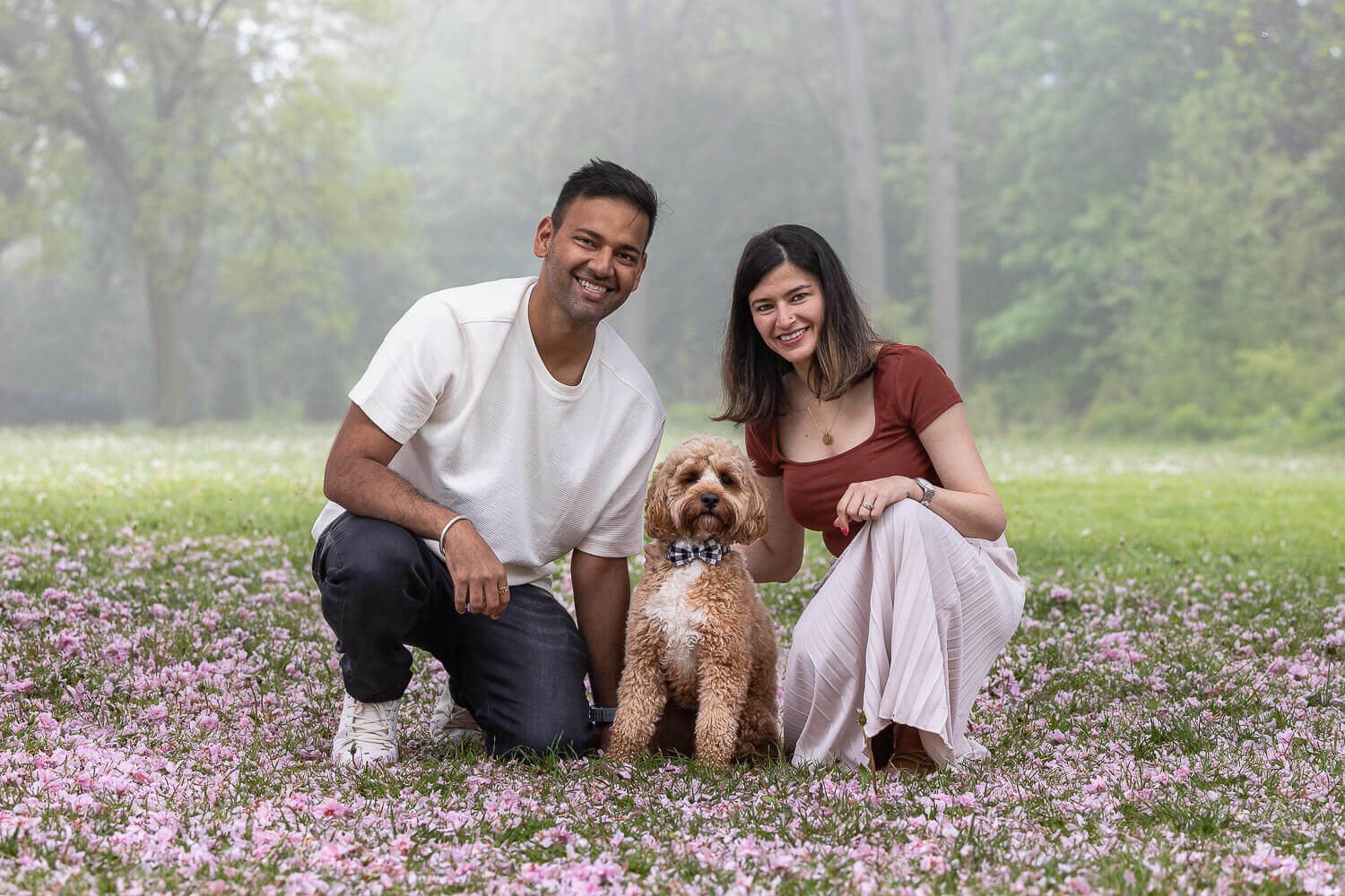 couple with a dog photoshoot Family photos with pets taken in Oakville, Ontario.