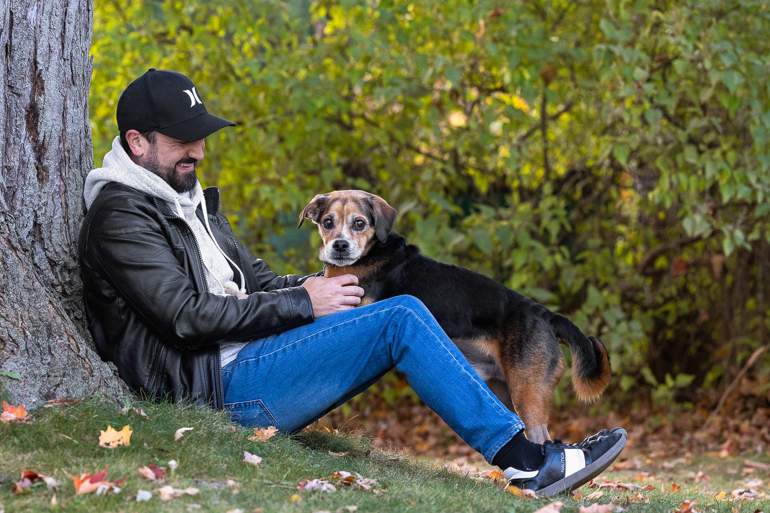 dog family photos in Burlington family photoshoot with dogs at Paletta Mansion.